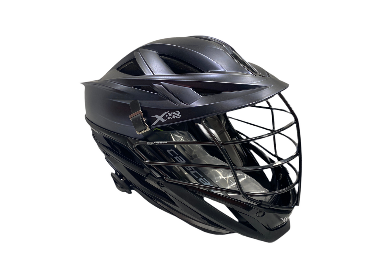 The Cascade XRS PRO Field Lacrosse Helmet by Cascade is shown in black with a metal faceguard on a white background, offering elite on-field performance and available in custom colours.