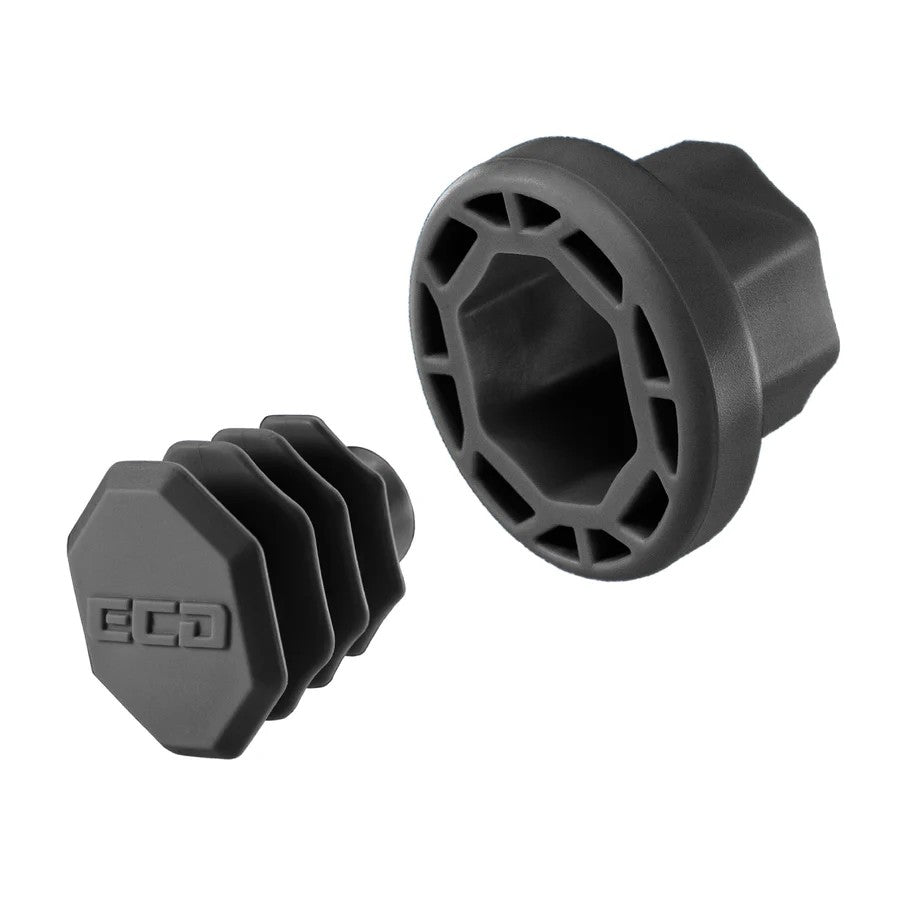Two black ECD Lacrosse Sliding End Caps by ECD, both hexagonal with textured ridges and geometric details—one shown from the side, one from the top—each features the ECD logo for enhanced lacrosse stick grip.