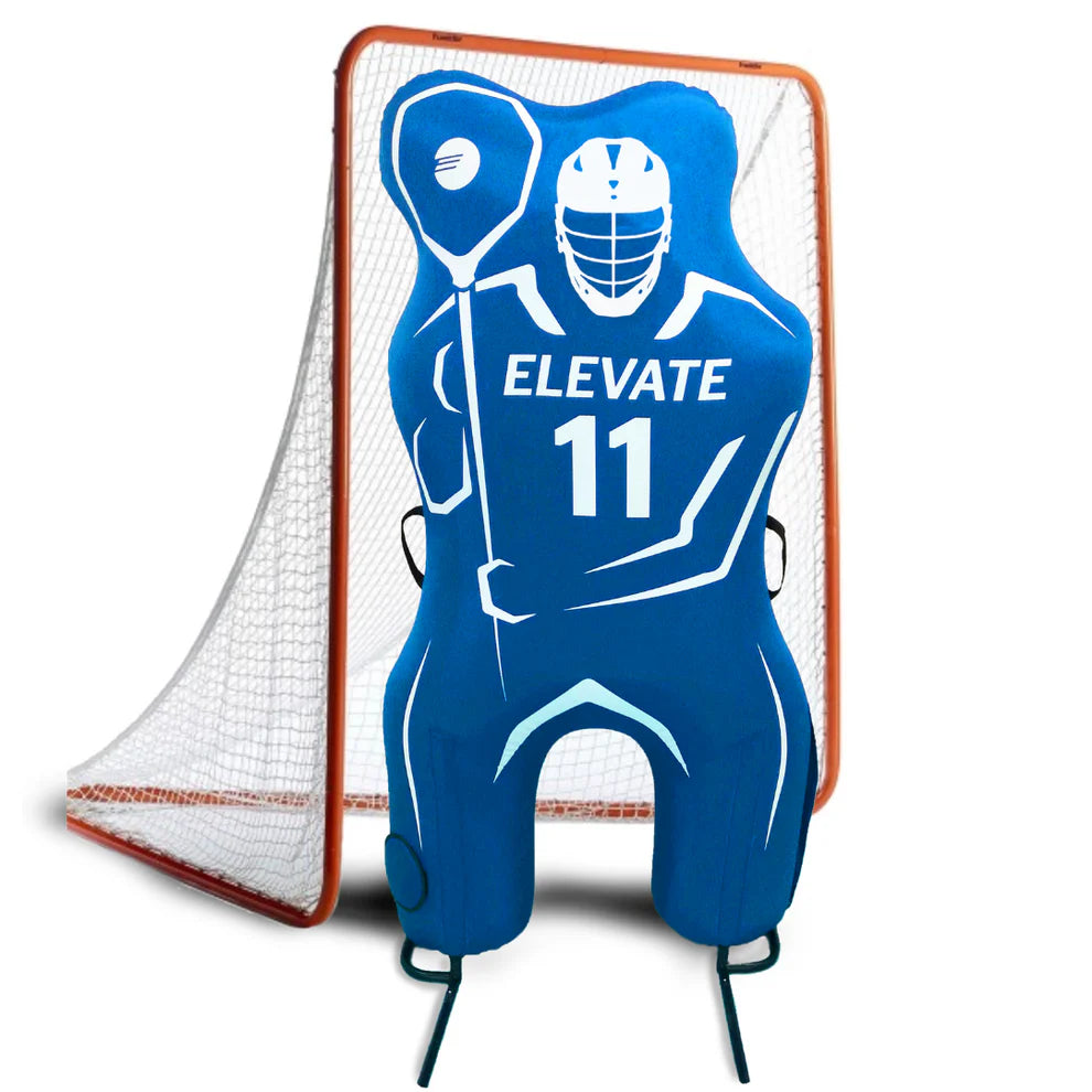 The Elevate 11th Man Goalie Pro, a blue inflatable goalie dummy by Elevate, stands before an orange and white lacrosse goal, featuring a realistic goalie graphic for effective lacrosse training.