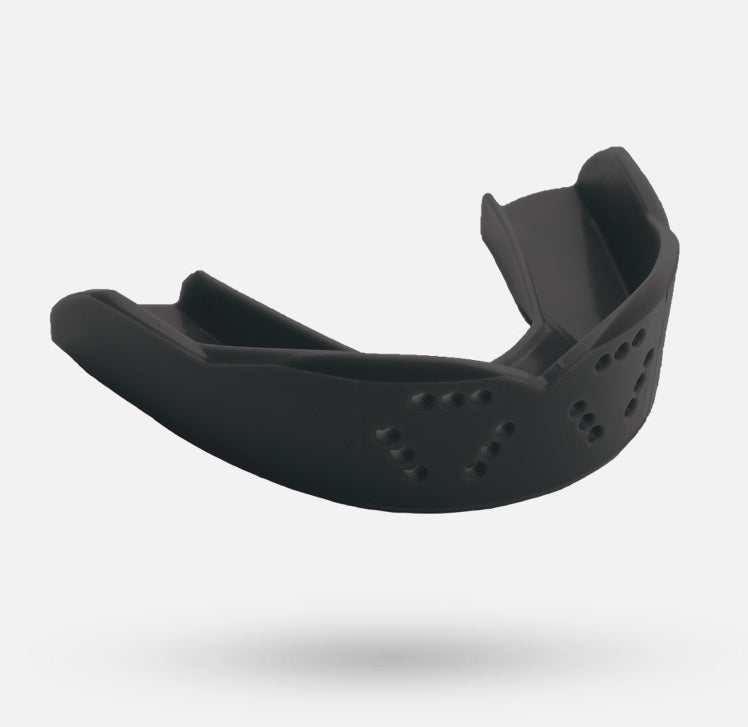 The Sanderson Lacrosse CCM 3D Mouth Guard SISU, a slim sports mouthguard with ventilation holes, is displayed floating against a plain white background.