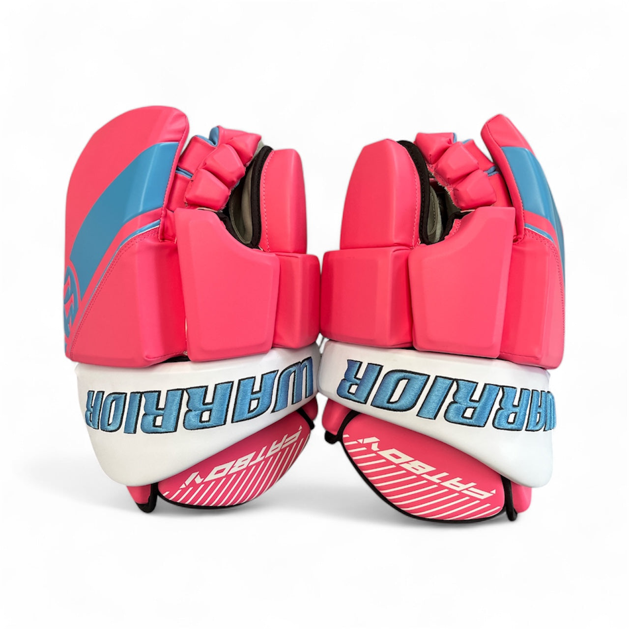 The Warrior Fatboy Box Goalie Glove 2025 by Warrior is shown in bright pink and blue, with bold WARRIOR branding on white cuffs, positioned facing each other on a white background for elite-level goalie protection.