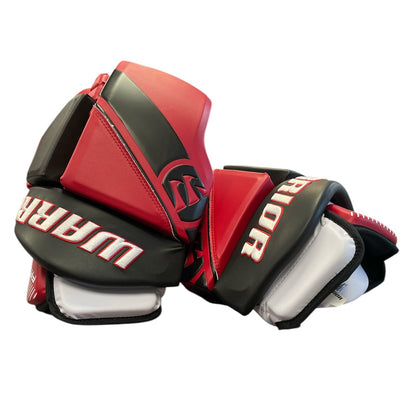 A pair of Warrior Fatboy Box Goalie Glove 2025 by Warrior, in red, black, and white, displayed side by side on a white background. These gloves provide elite-level protection for box lacrosse goalies.