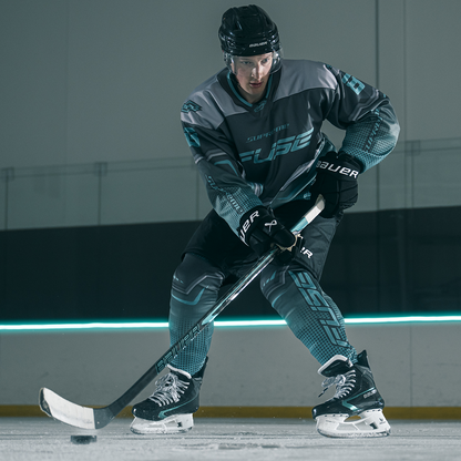 Bauer Supreme Fuse Grip Hockey Stick Youth 2026 – full stick lifestyle shot – Sanderson Lacrosse