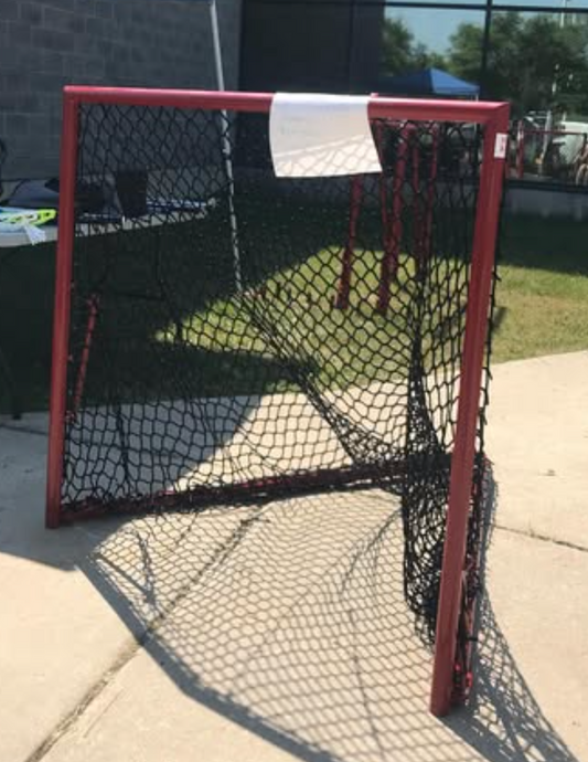 defender lacrosse net red with black mesh