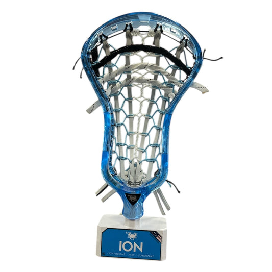 ECD Ion Frost lacrosse head strung with traditional light grey, blue, white and black pocket on stand