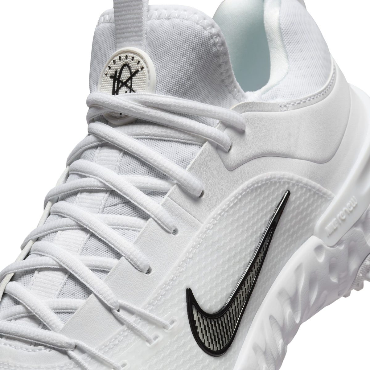 Nike Huarache 9 Elite Turf lacrosse shoes, White/White/Black (FN0310-101), close-up of lacing and Flywire upper