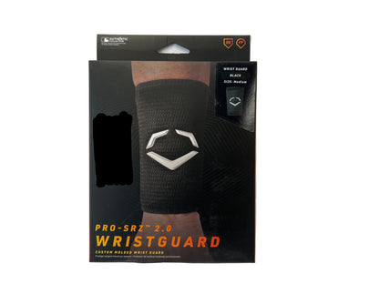 A box of Sanderson Lacrosse Evoshield Pro-Srz 2.0 Wristguard in black, size medium, with white and orange text, hexagonal logo on packaging, image of wristguard worn on forearm; ships to Canada.