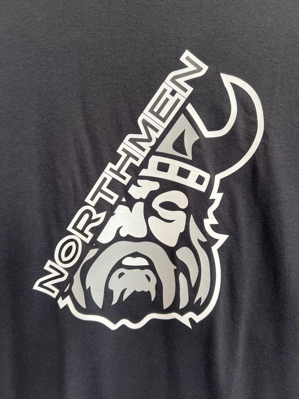 The Sanderson Lacrosse Northmen Lacrosse Under Armour Cotton T-shirt features a Viking warrior’s face with NORTHMEN across it on a dark background—ideal for lacrosse fans or as a standout Northmen Lacrosse tee.