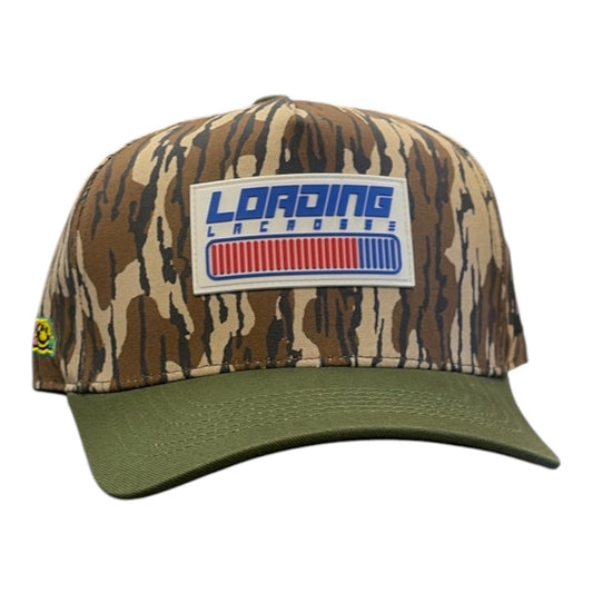 Loading Lacrosse Trademark snapback hat with camo crown, olive green brim and rubber Loading Lacrosse loading-bar patch, front view